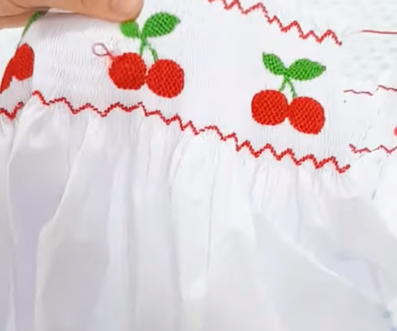 How to embroider cherry patterns on smocked fabric