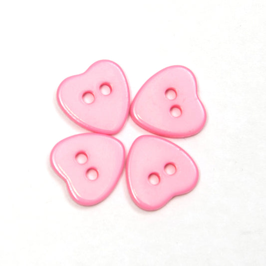 Pink heart plastic button